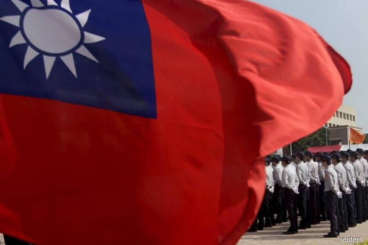 Taiwan claims entrapment after China shows spy ‘confession’