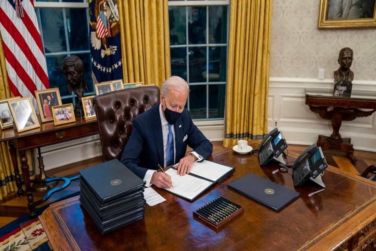 On day one, Joe Biden signs 17 orders to undo Trump’s legacy