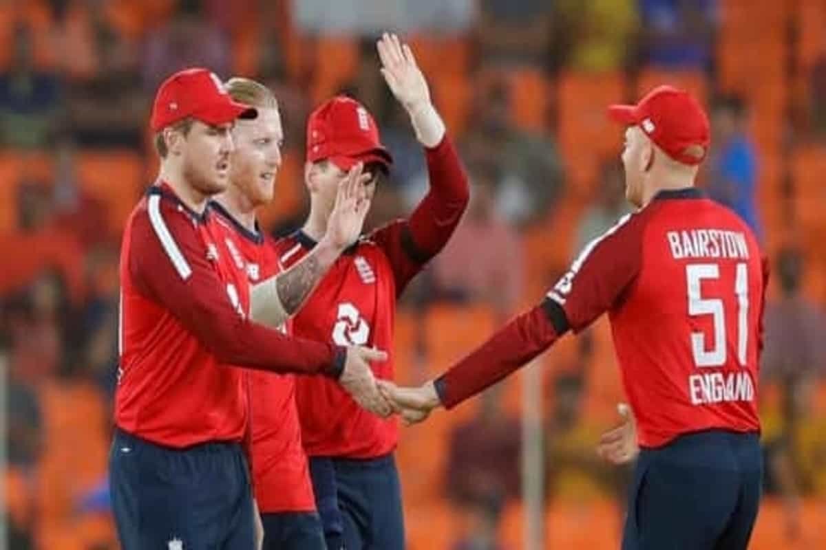 England players wear black armbands in memory of Joey Benjamin