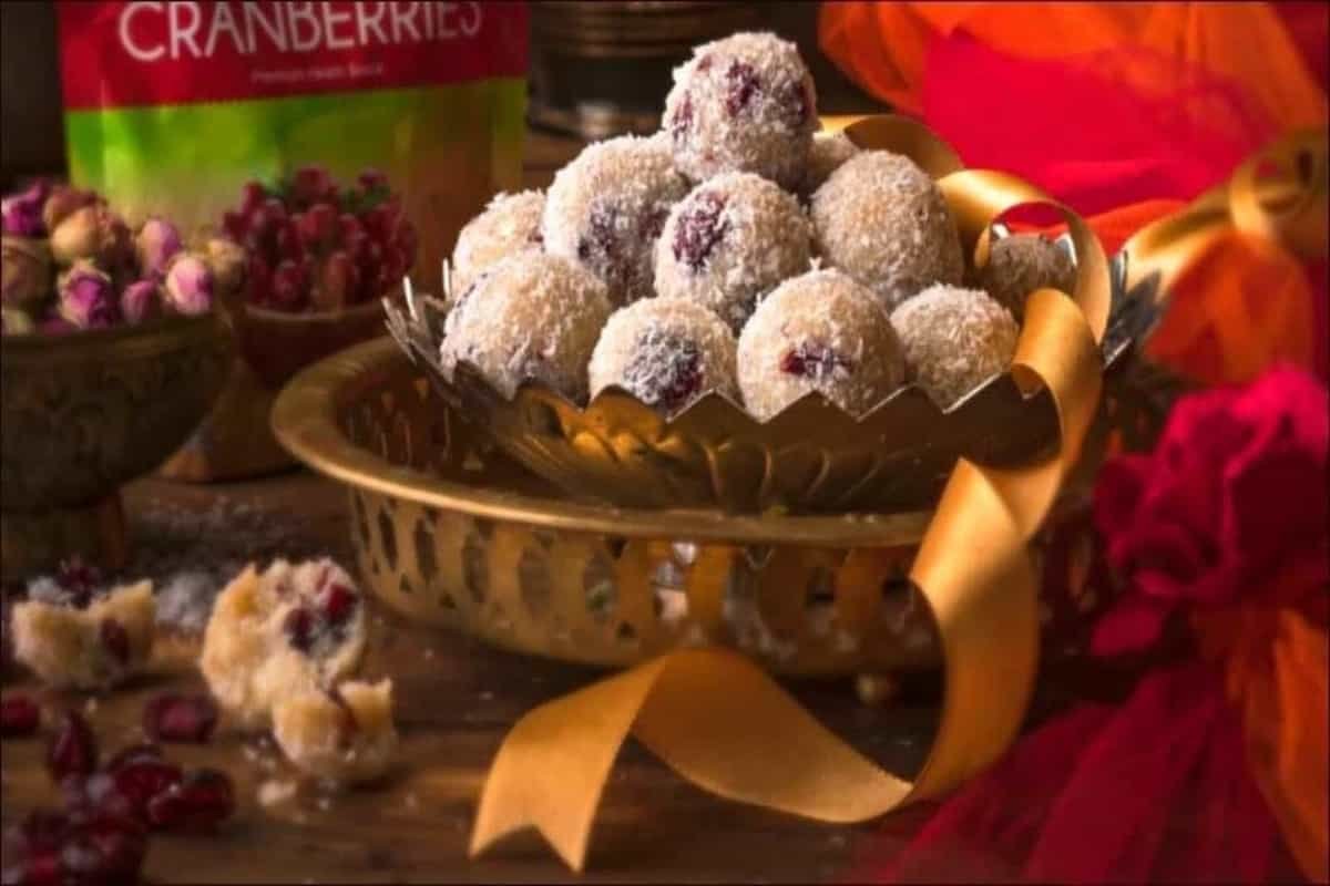 Whip up some cranberry coconut laddoos to make guests drool on Holi 2021