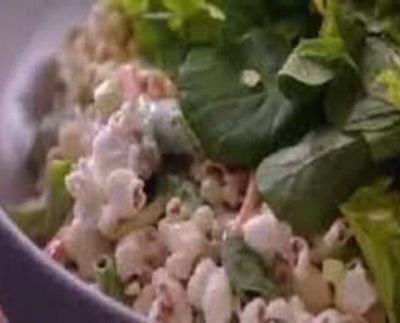 Woman mixes popcorn with salad, leaves netizens asking ‘why’