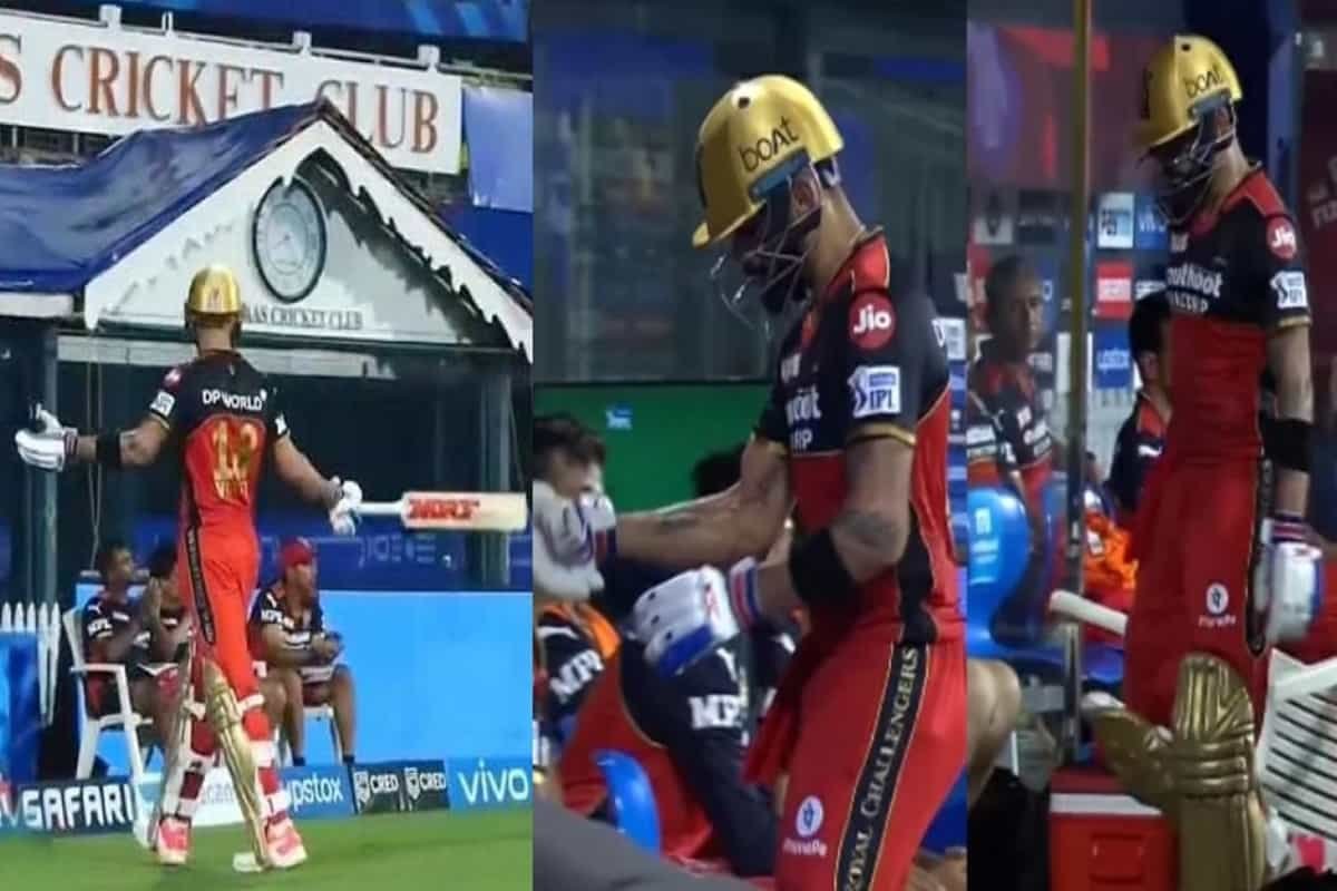 IPL 2021 : Virat Kohli reprimanded for hitting boundary cushion and chair near RCB dugout