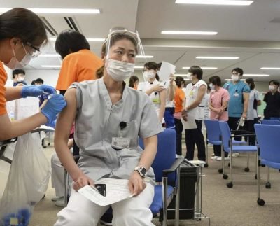 Japan's foreign residents may travel to other countries for Covid-19 vaccines