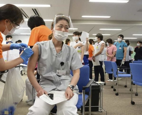 Japan's foreign residents may travel to other countries for Covid-19 vaccines